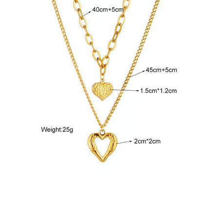  Product Title: 2-Piece Heart and Geometric Pendant Necklace Set – Titanium Steel in Gold or Silver