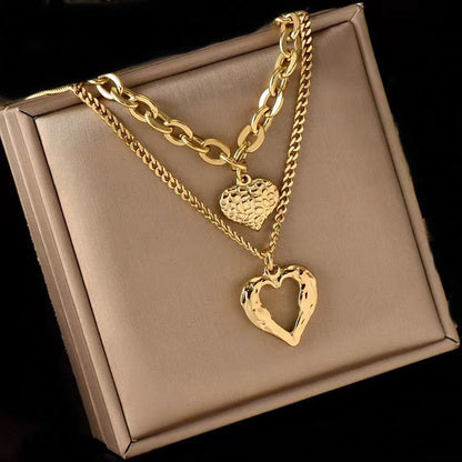  Product Title: 2-Piece Heart and Geometric Pendant Necklace Set – Titanium Steel in Gold or Silver